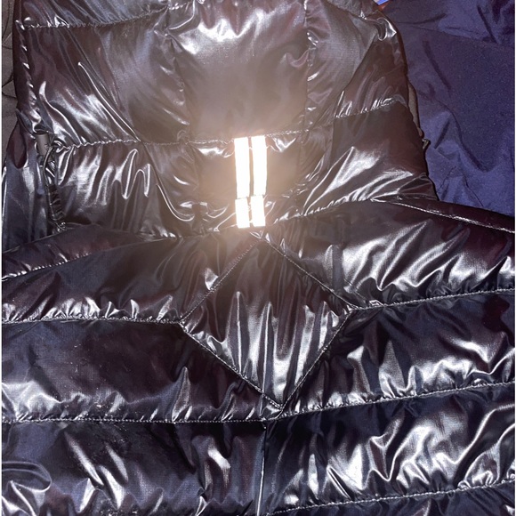 Canada goose, hooded crofton down puffer, size small in men.